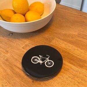 Black Round Ceramic Coaster with White Bicycle Graphic